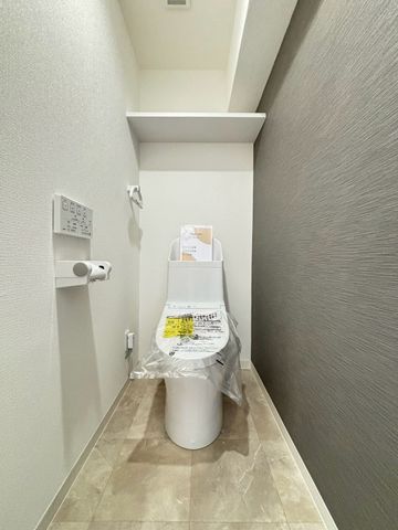 �����������s��2���ڂ̒��Ã}���V�����̃g�C��